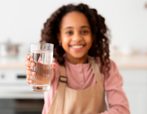 girl with glass of water